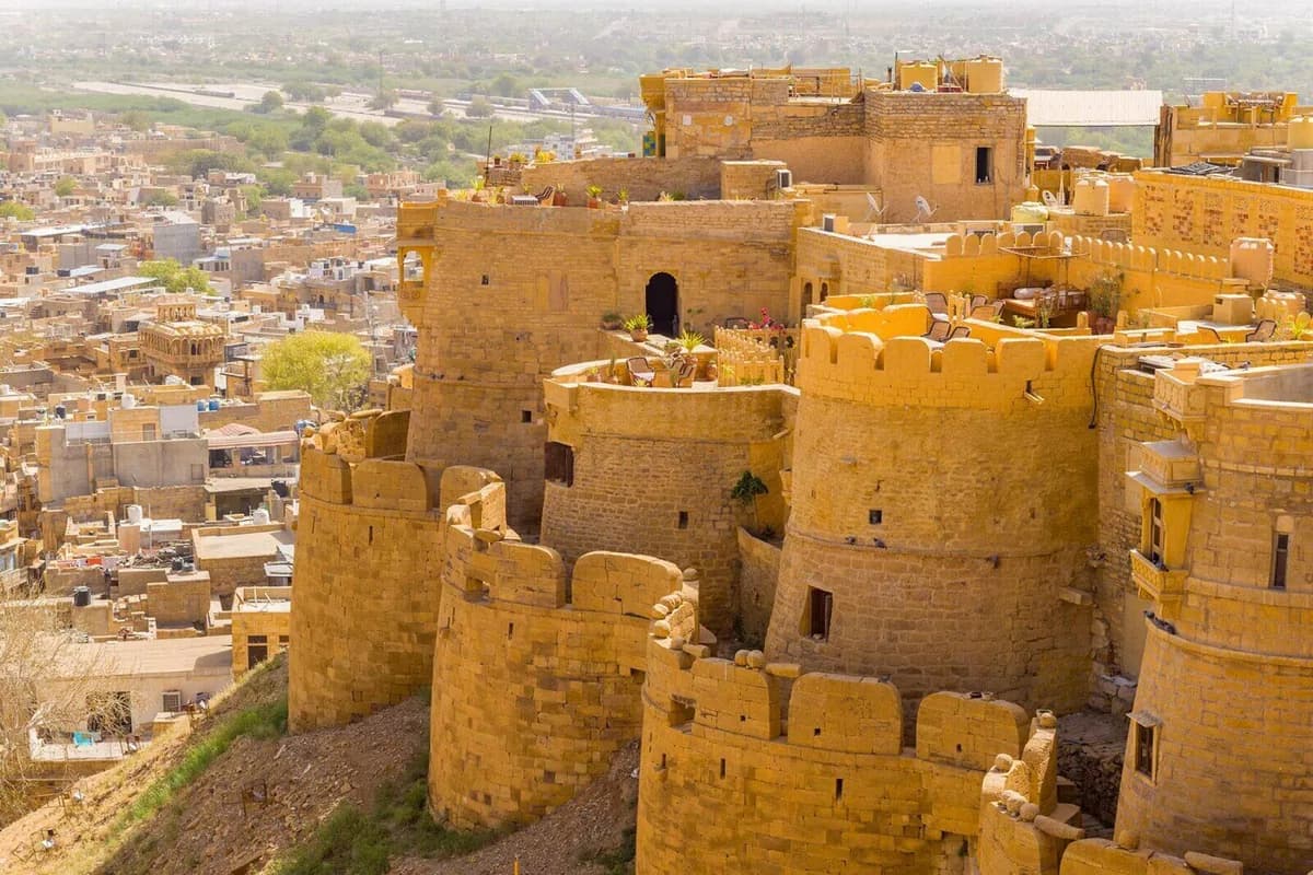 Jaisalmer Fort's golden sandstone walls at sunset