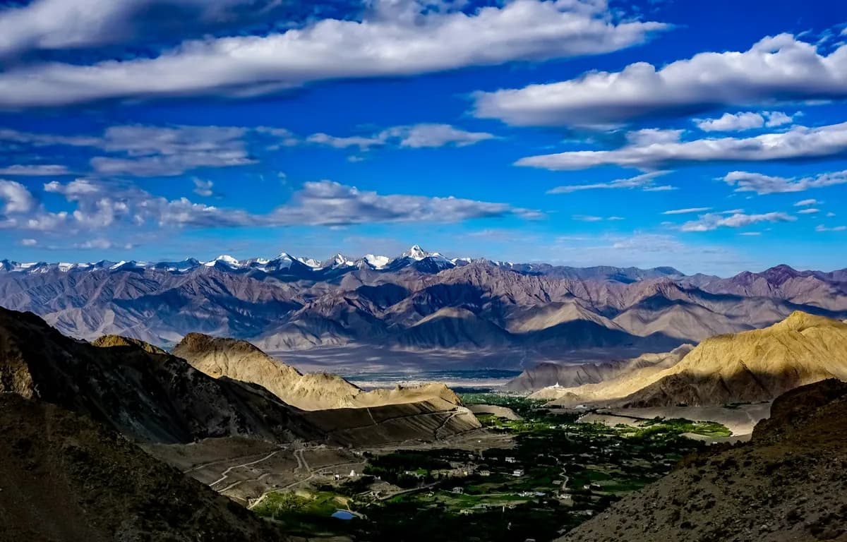The Leh valley seen from above, with the Himalayas beyond